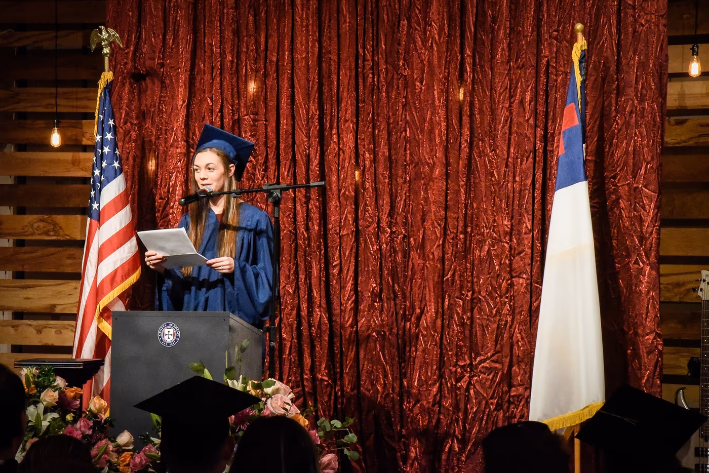 A Geneva Academy senior delivers a graduation address at a classical Christian school in Roseburg, Oregon