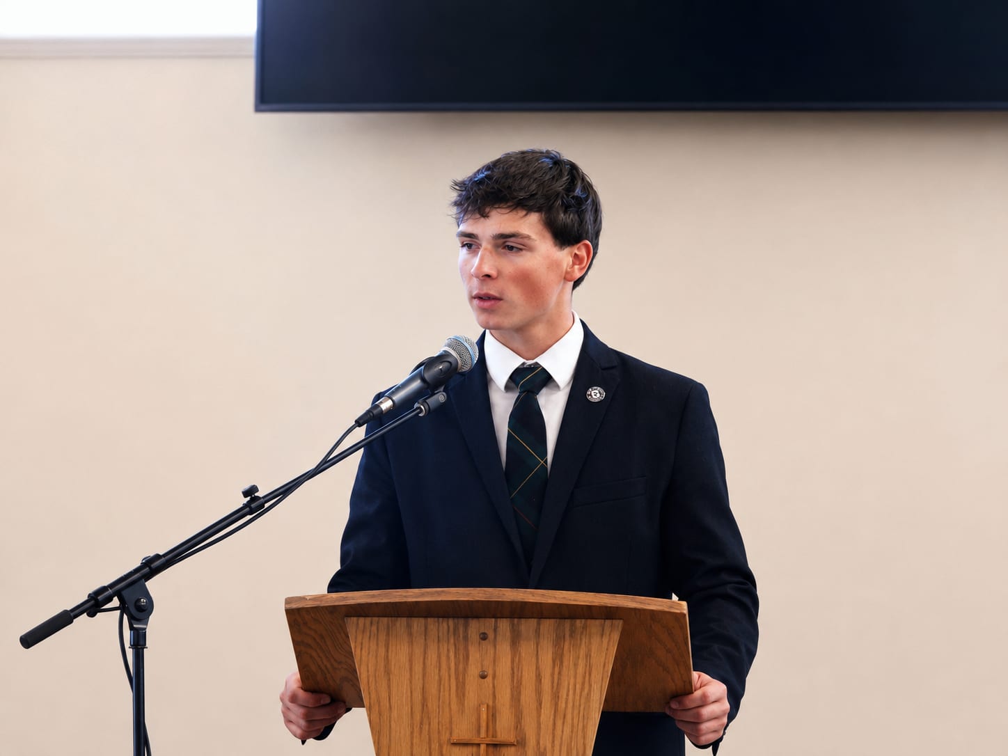 A Geneva Academy senior defends a thesis at a classical Christian school in Roseburg, Oregon
