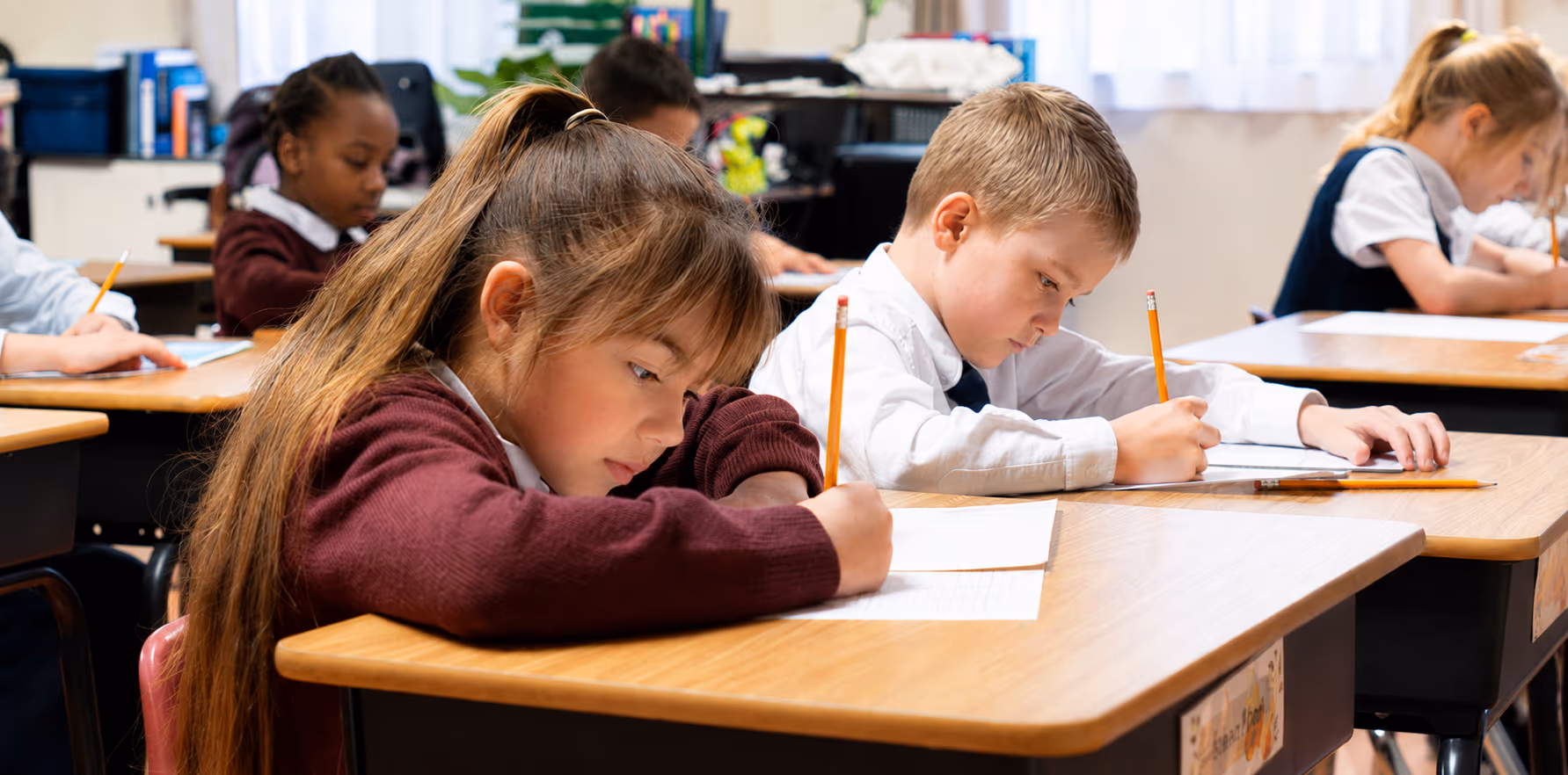 Geneva Academy students writing at their desks in Roseburg, Oregon